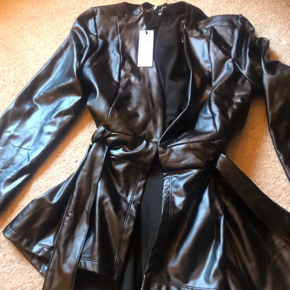 Faux leather peplum style with belt top or jacket - Picture 2 of 7